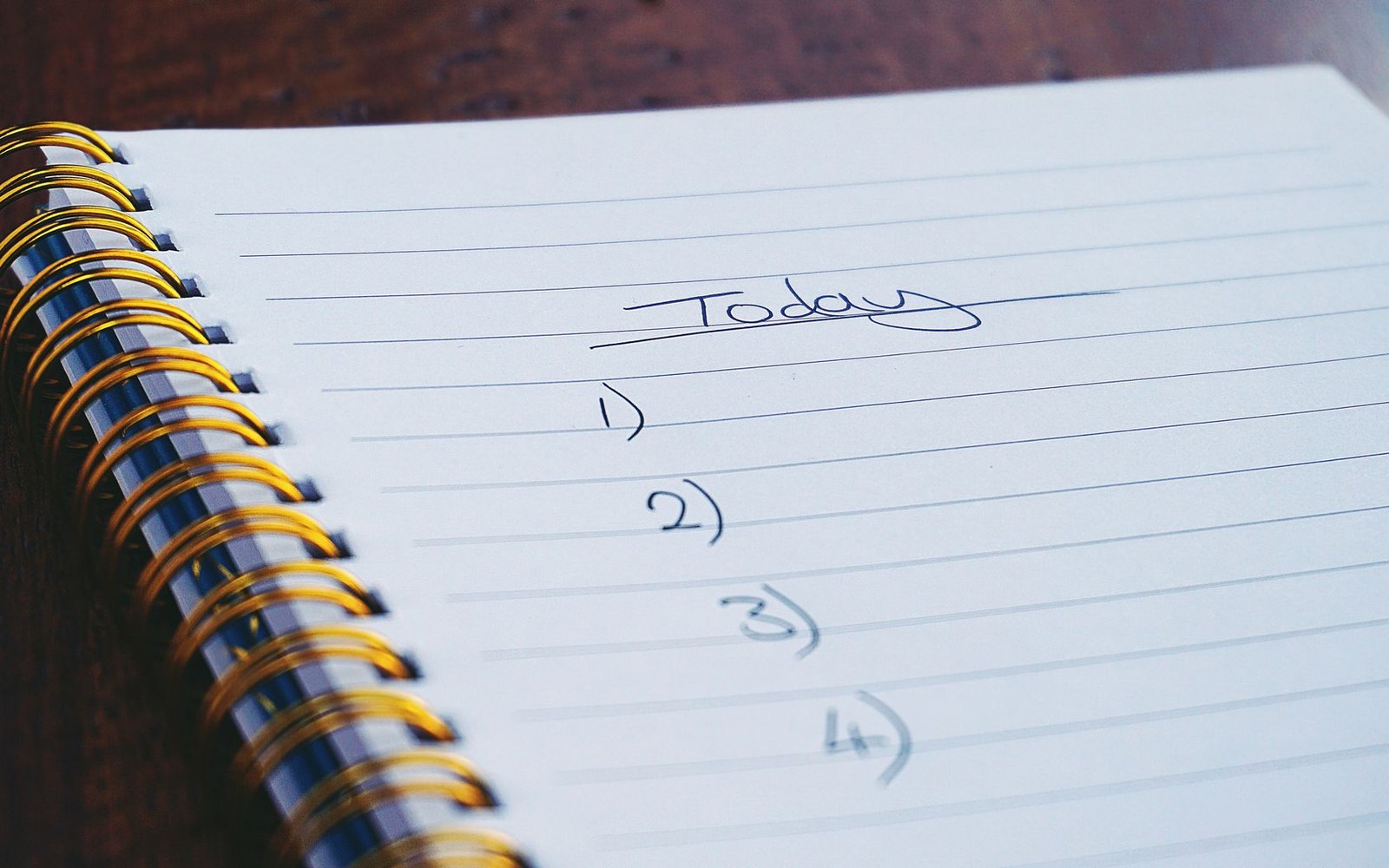 A spiral notebook page headed "Today" with a blank numbered list underneath